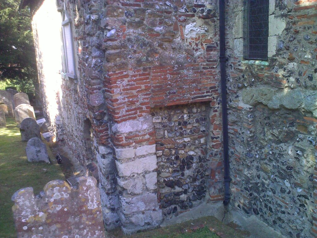 Photo of St Martin's Church - where the Church of England began. showing Roman tiles in the wall.
