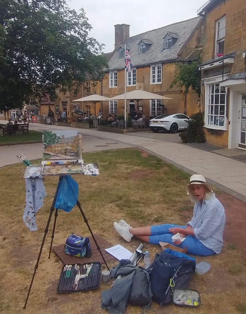 Artist painting in the Broadway 'Great Paint off'