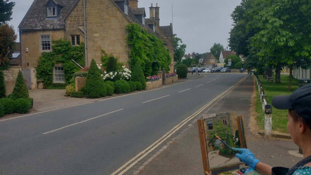 Artist painting in the Broadway 'Great Paint off'