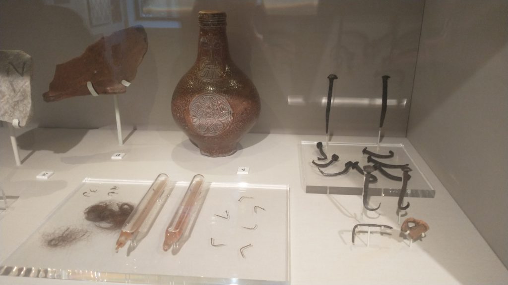 A Witch bottle and Contents on display at Greenwich Tourist information Centre